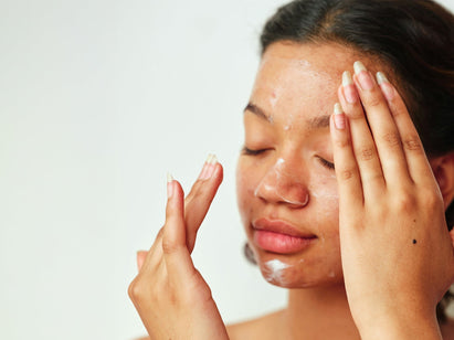 woman applying face cream