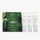 White background. Three white tubes with mint-green bases stand next to a green box featuring a leafy print. image