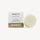 White and brown shampoo bar box next to a round, light beige shampoo bar on a light background. image