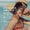 A smiling woman wearing a straw hat relaxes in a pool, highlighting the skin benefits of Scent Free Sun Cream SPF30.